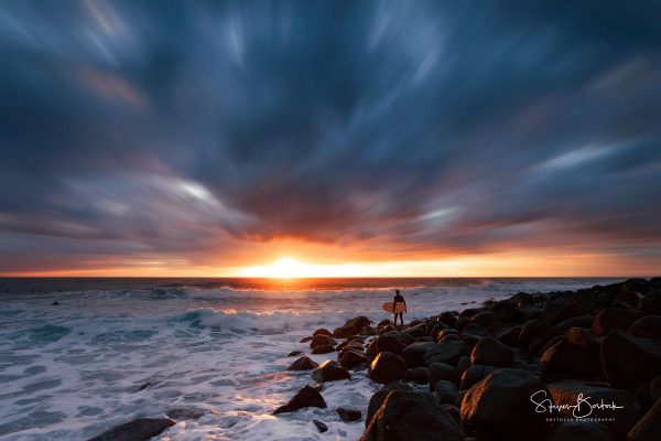 lone surfer sunrise rocks burleigh heads gold coast