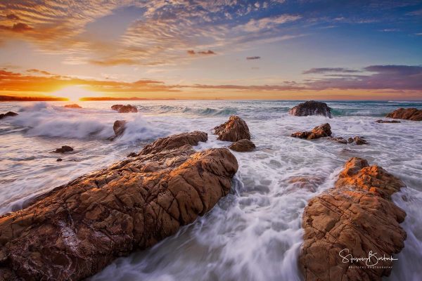 rocks waves sunset kirra point beach gold coast